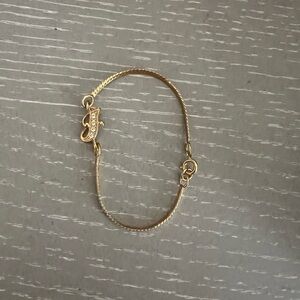 Gold Bracelet with “J” initial .